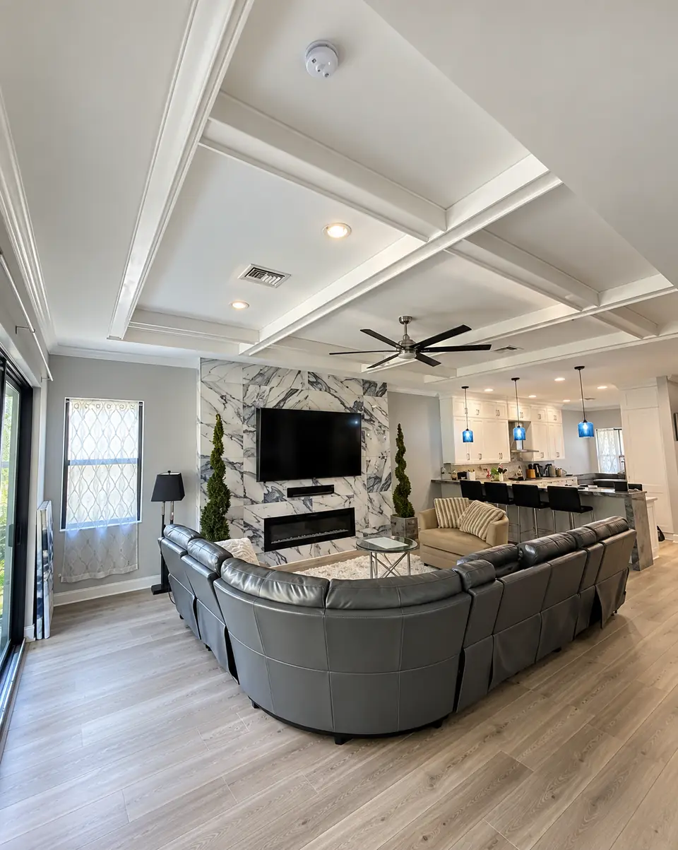 White coffered ceiling grid over an open great room