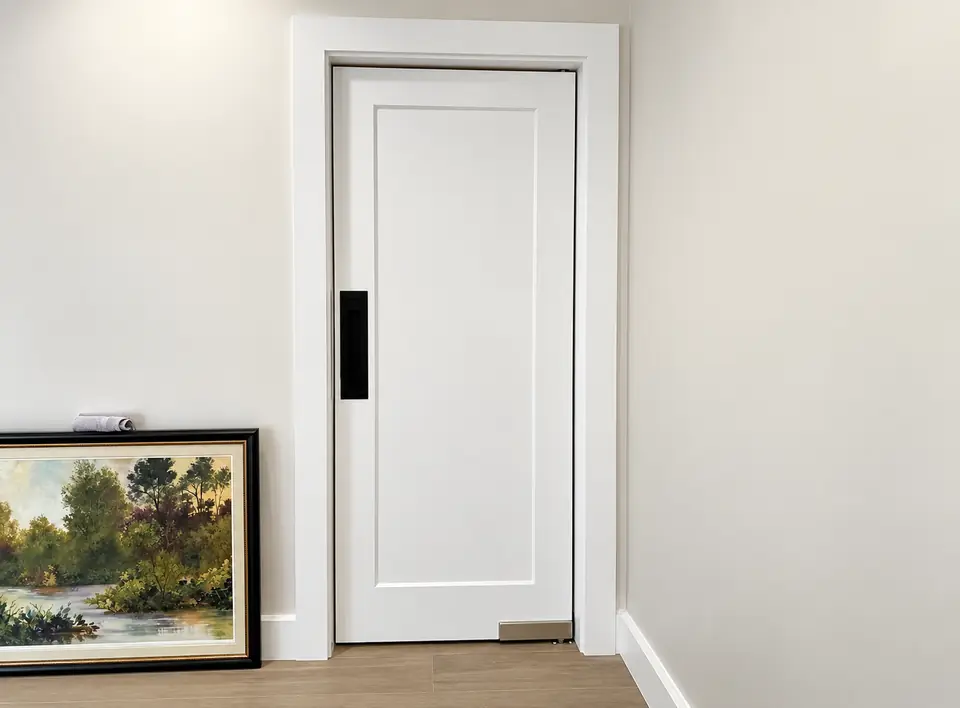 Modern flat-panel interior door with black hardware