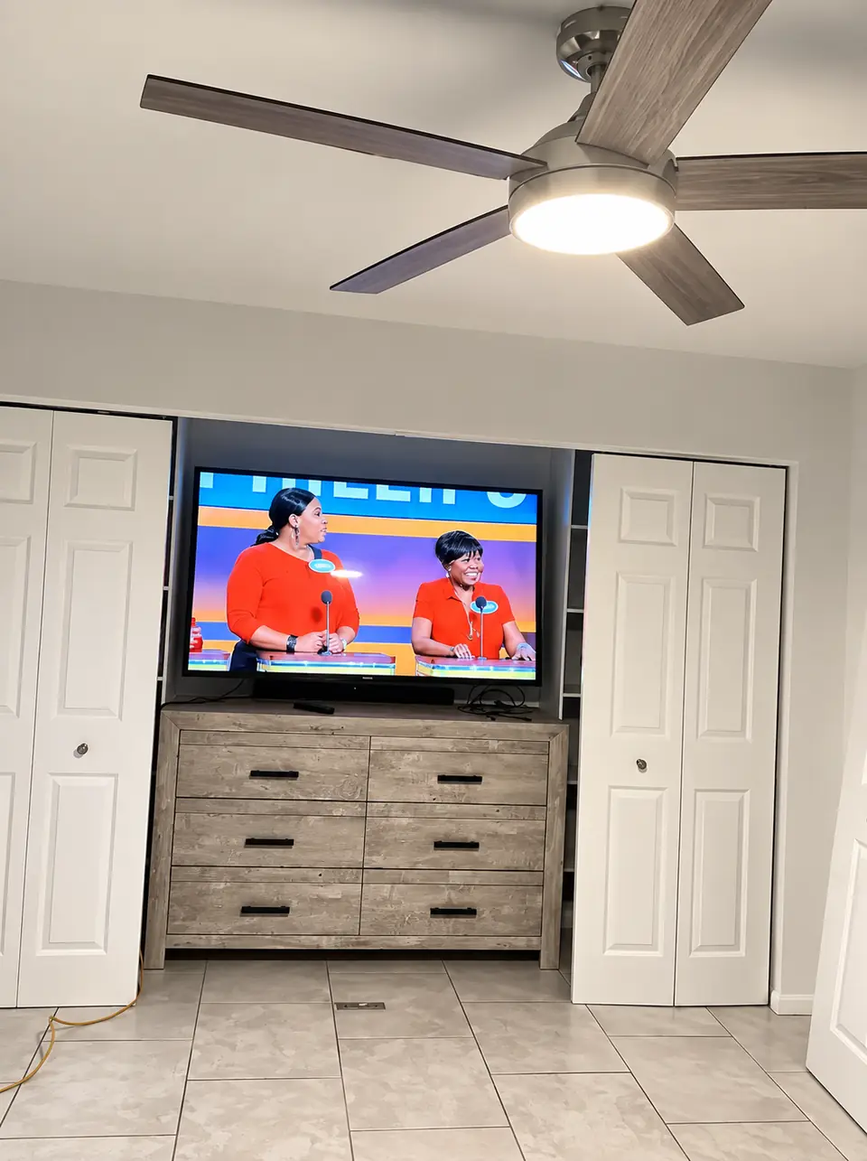 Built-in TV wall with cabinets and drawers