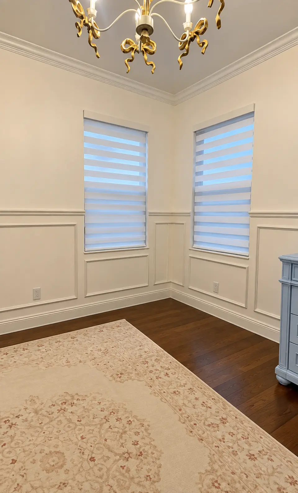 Wainscoting and chair rail in a sunlit dining room
